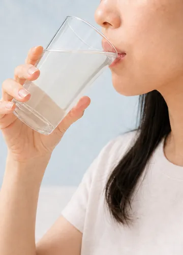 Drinking a glass of water