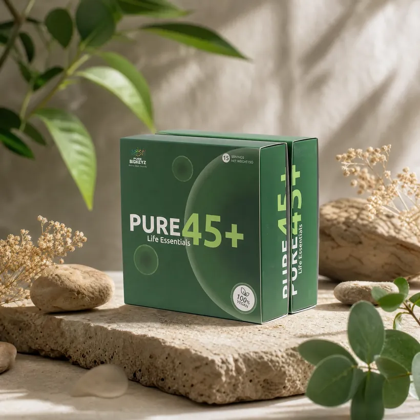 Two Pure 45+ boxes styled on stone with foliage