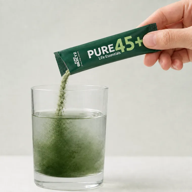 Pouring Pure 45+ into a glass of water